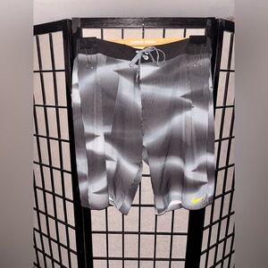 Nike Black and White Patterned Shorts with Yellow Logo